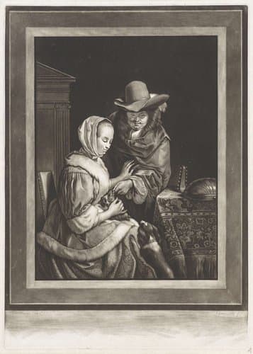 Een man en een vrouw met twee honden