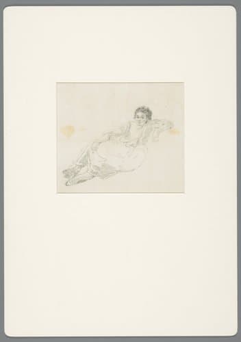 Op de grond zittende boerin