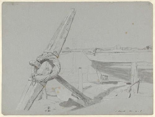 Anker en een gedeelte van een schip bij laag tij