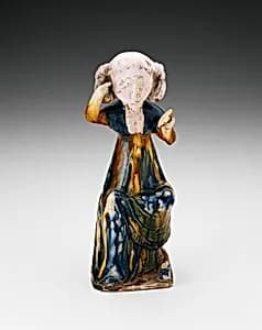 Seated Girl Holding Mirror by Unknown