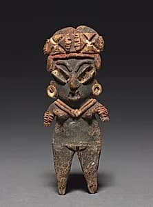 Archaic Figurine by Unknown Artist