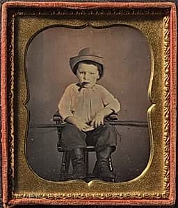 Boy with Cigar by Unknown Artist