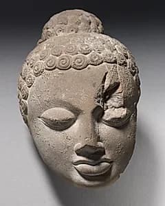 Fragment of Head of Buddha by Unknown Artist