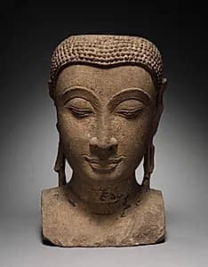 Head of Buddha by Unknown Artist
