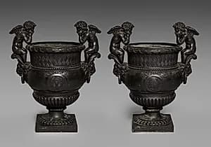 Pair of Urns with Putti by Unknown Artist