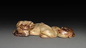 Reclining Dog and Puppy by Unknown Artist