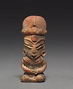 Seated Female Figurine by Unknown Artist
