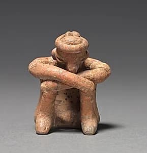 Seated Male Figurine by Unknown Artist