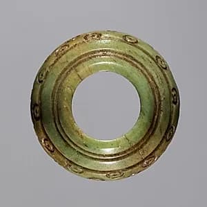 Spindle Whorl by Unknown Artist