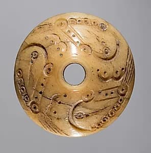 Spindle Whorl by Unknown Artist