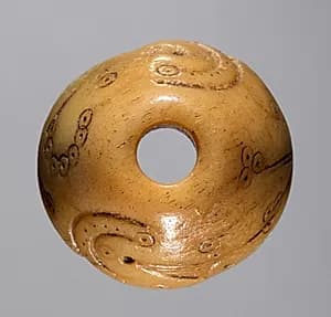Spindle Whorl by Unknown Artist