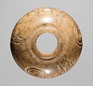 Spindle Whorl by Unknown Artist