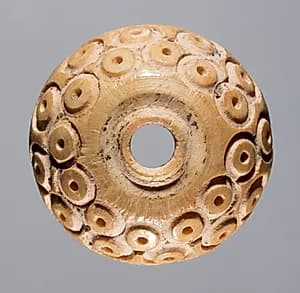Spindle Whorl by Unknown Artist