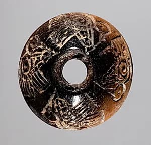 Spindle Whorl by Unknown Artist