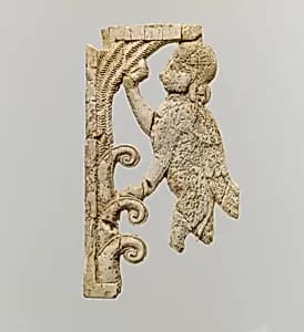 Openwork plaque with a sphinx at a tree by Unknown Artist