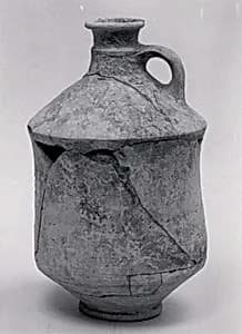Pot with handle by Unknown Artist