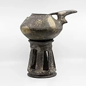 Spouted jar and stand by Unknown Artist