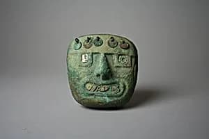 Face Mask Ornament by Unknown Artist