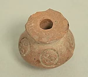 Spindle Whorl by Unknown Artist