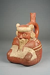 Stirrup spout bottle with sitting figure by Unknown Artist