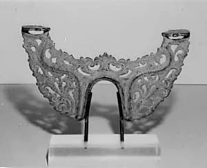 Suspension Part for a Musical Instrument called "Gender" by Unknown Artist