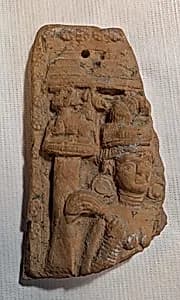 Fragment of a Plaque with a Female Head by Unknown Artist