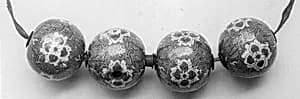 Beads (four) by Unknown Artist