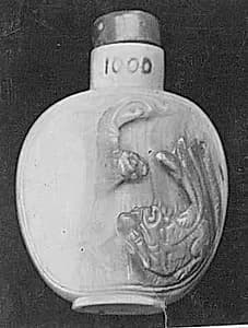 Snuff bottle with stopper by Unknown Artist