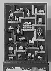 Vitrine Containing Twenty-Five Ornaments by Unknown Artist