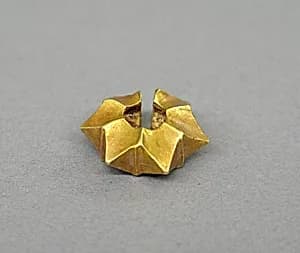 Ear Clip in the Shape of a Starfruit by Unknown Artist