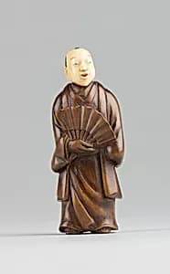 Netsuke of Figure with an Ivory Head by Unknown Artist