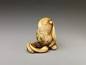 Netsuke of Octopus Holding Clam by Unknown Artist