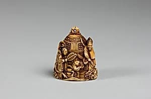 Netsuke in the form of a Bell Ornamented with Waves and Figures by Unknown Artist