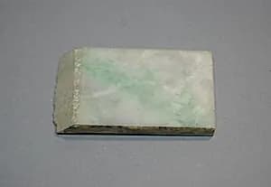 Plastic Box with Piece of Burma Jadeite by Unknown Artist