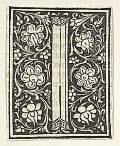 Initial letter I with flowers
