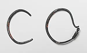 A pair of earrings by Unknown Artist