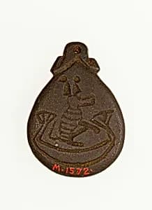 Amulet illustrating a baboon in a boat by Unknown Artist
