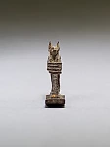 Anubis (?) supporting a large djed pillar by Unknown Artist