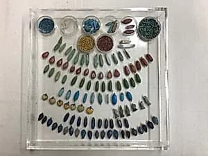 Collar pendants and beads by Unknown Artist
