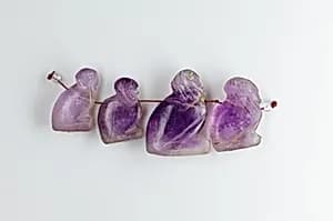 Female sphinx amulet by Unknown Artist