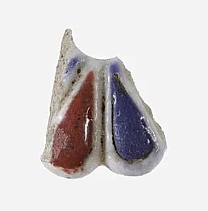 Fragment of a Bead in the Form of a Daisy by Unknown Artist