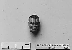Head Amulet by Unknown Artist