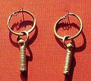 Hoop earrings with coiled wire pendant by Unknown Artist