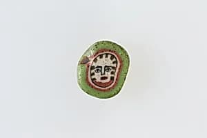 Inlay / bead blank with face by Unknown Artist