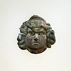 Ornamental mask by Unknown Artist