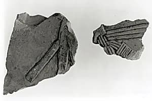 Raised relief fragment by Unknown Artist