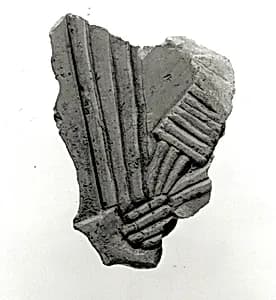Raised relief fragment by Unknown Artist