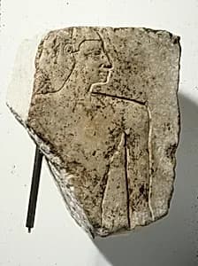 Relief fragment of man's upper body by Unknown Artist