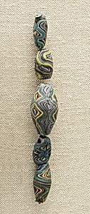 String of 5 Beads by Unknown Artist