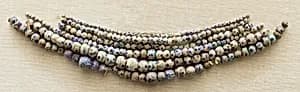 String of 5 Eyed Beads by Unknown Artist